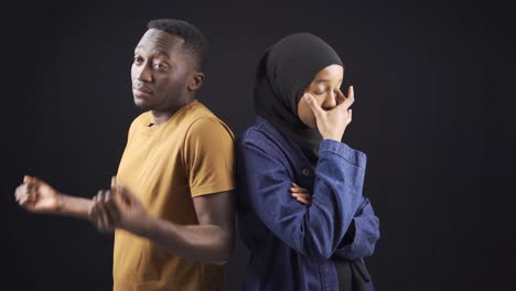 Muslim-African-couple-are-unhappy-and-overwhelmed-in-their-marriage-or-relationship.
